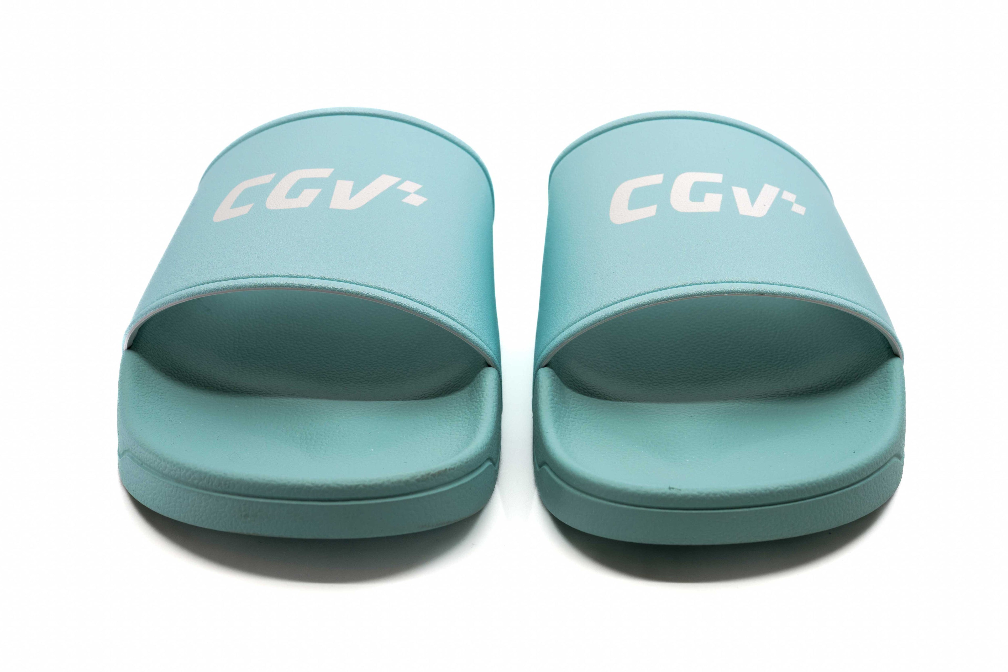 Sandales CGV turquoise à plat, vues de dessus, avec logo blanc contrastant.