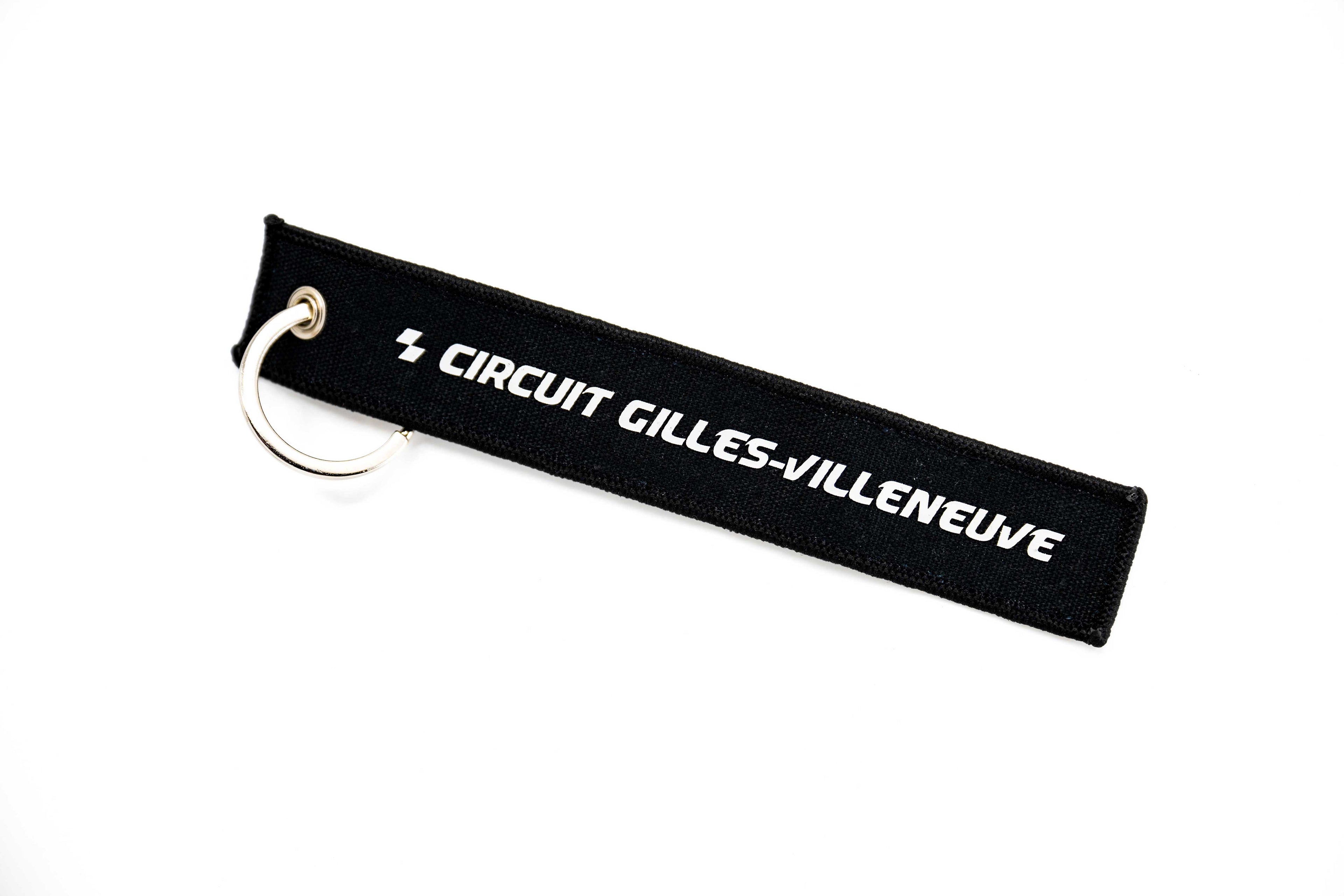 Porte-clés CGV noir à plat, avec lettrage blanc en contraste.