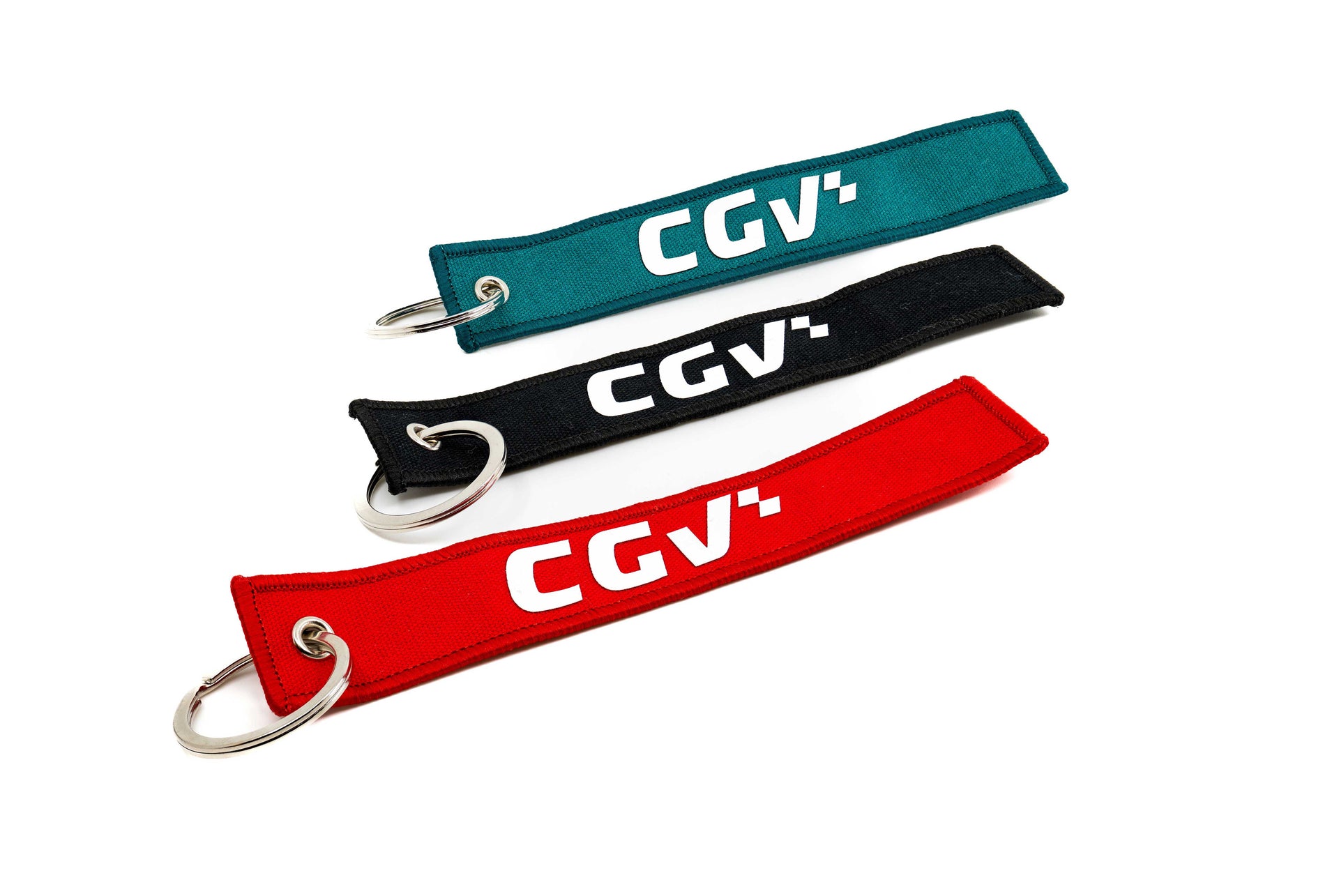 Trois porte-clés CGV en tissu, rouge, noir et turquoise, avec anneau métallique.